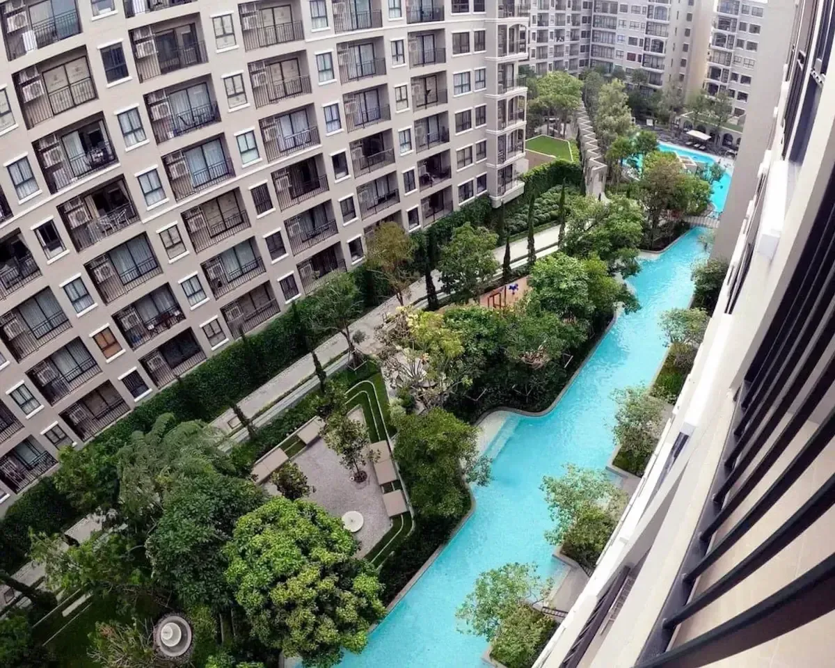 Aerial view of tropical gardens and sprawling swimming pool